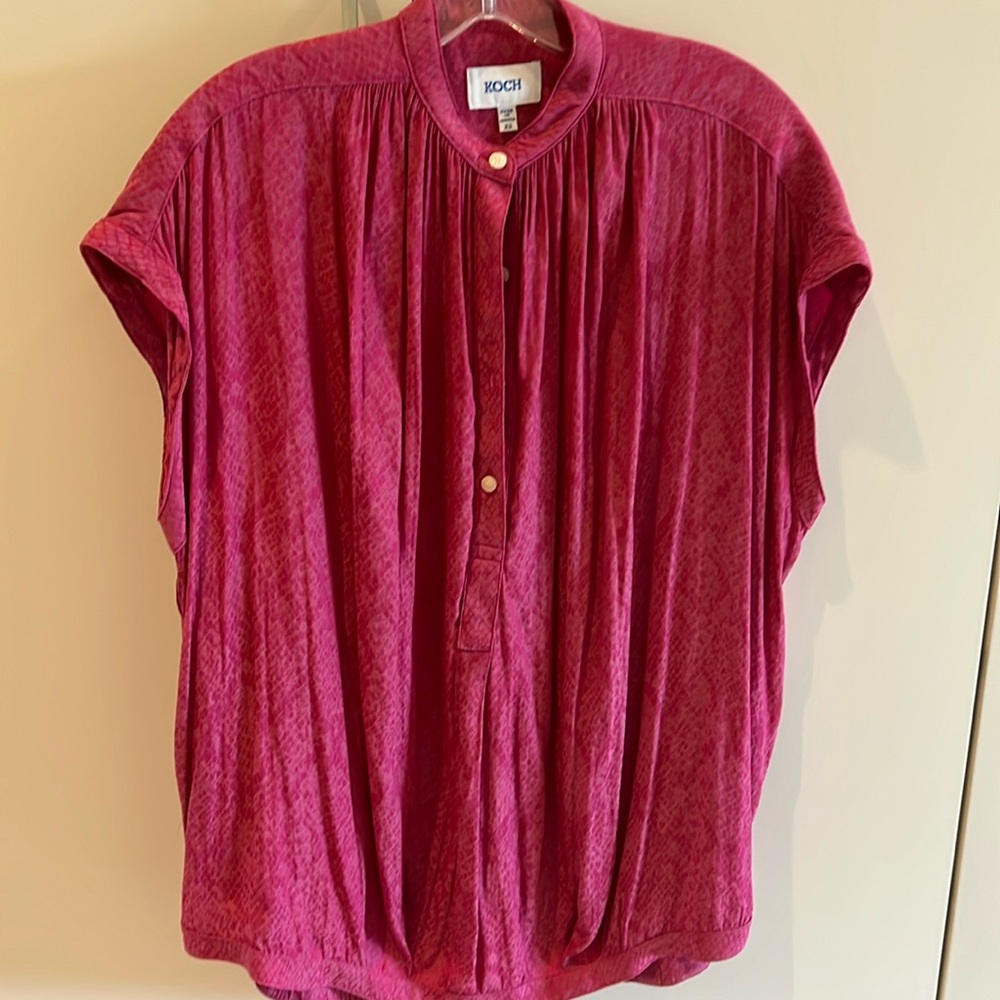 Designer Koch blouse.  Size XS buy fits up to size 12.  Oversized blousy fit.
